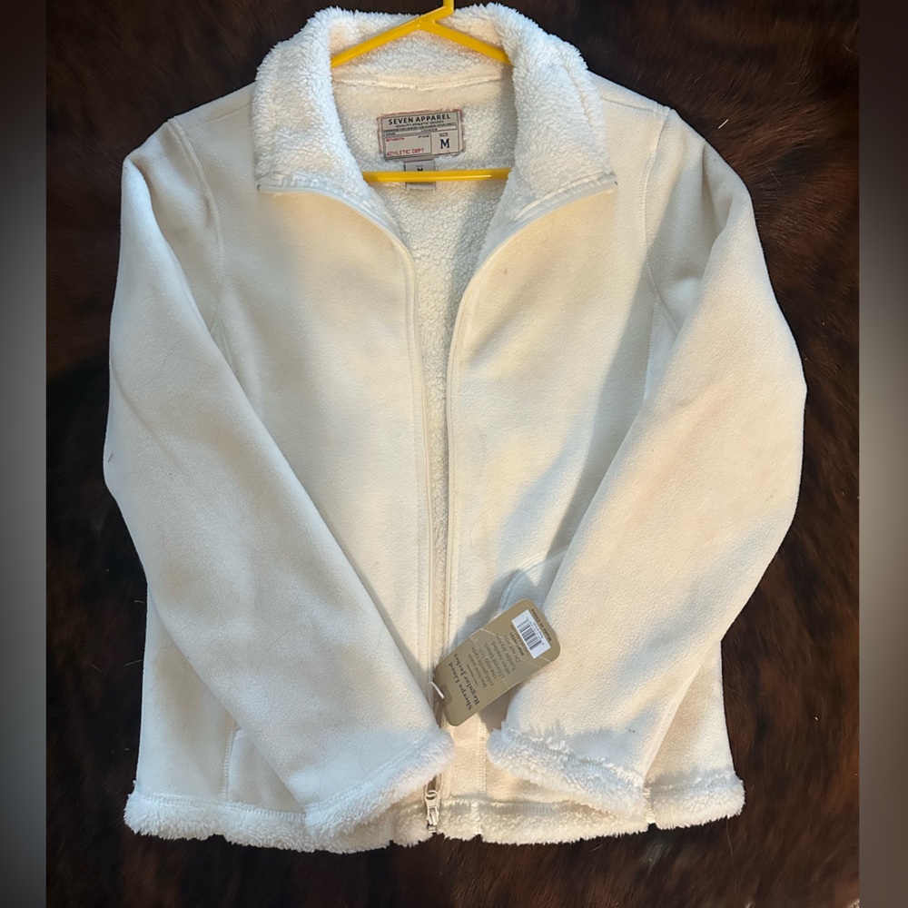 White Sherpa lined women’s jacket.